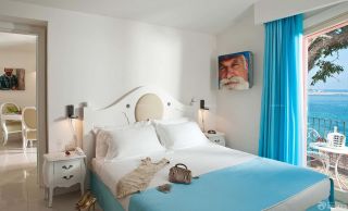 现代卧室装修效果图大全2023图片 蓝色窗帘装修效果图片