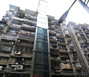 荔湾区旧楼加装电梯引纠纷 用混凝土和玻璃哪个好？