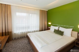 安置房60平方简装卧室绿色墙面装修效果图